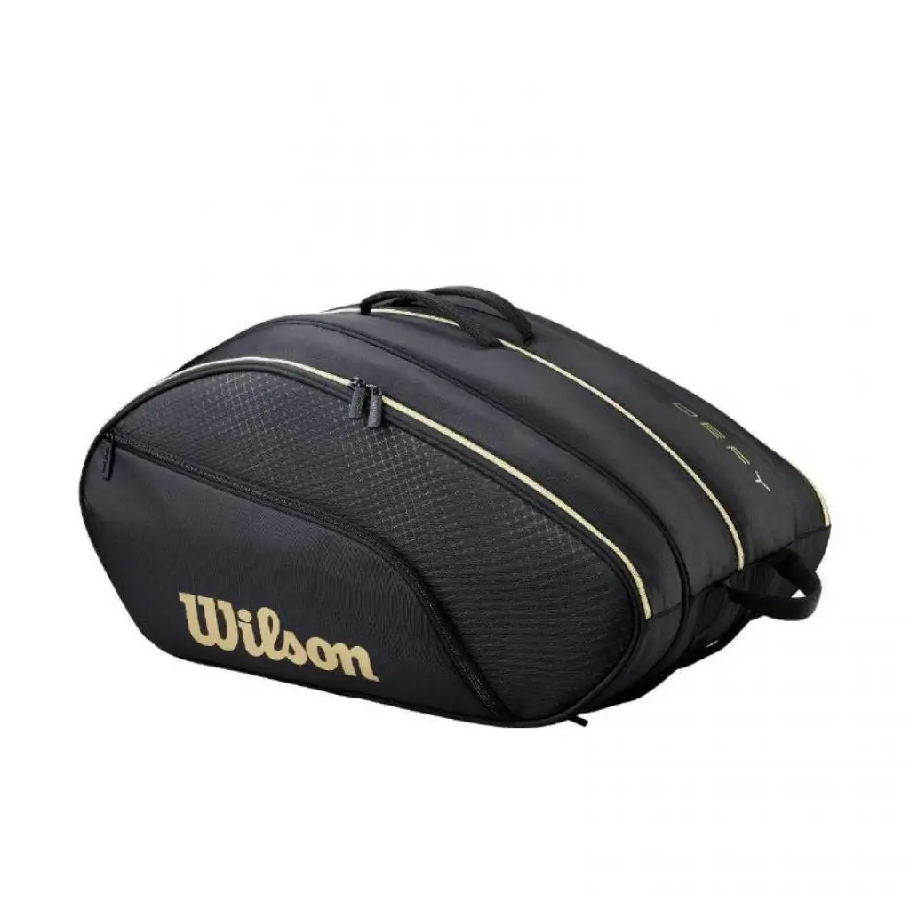 paletero-wilson-defy-v1-negro-dorado-es-2-1100x1100.webp