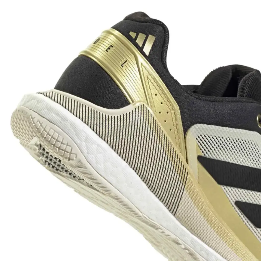 zapatillas-adidas-crazyquick-boost-padel-blanco-negro-oro-1-es-8-1200x1200.webp
